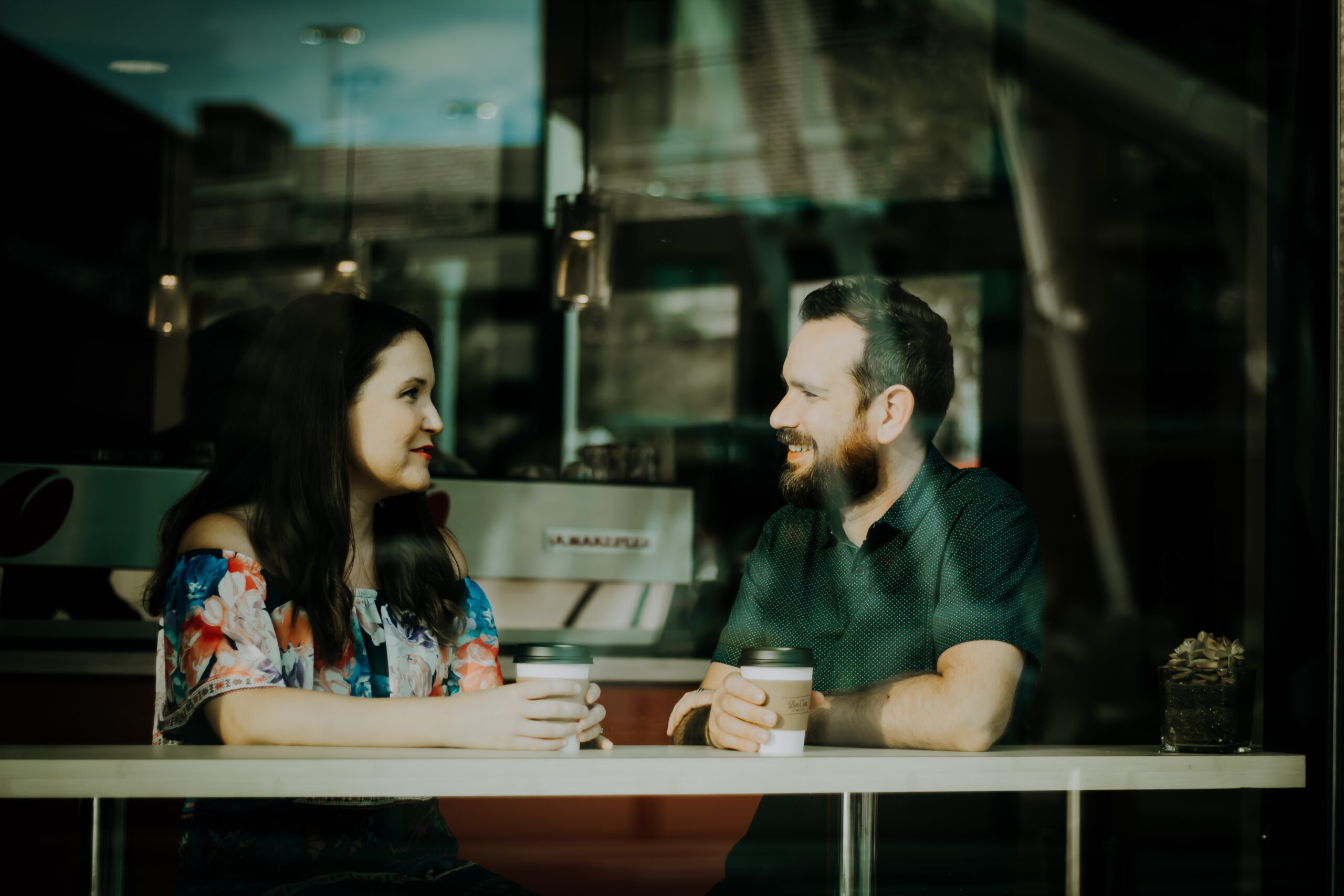 Couple having coffee while respectfully talking